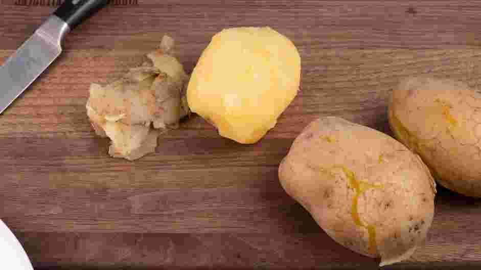 Italian Gnocchi Recipe: Peel the potatoes while they are still warm.