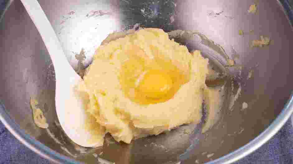 Italian Gnocchi Recipe: Make a “volcano” with the mashed potatoes and then create a “crater” at the center.