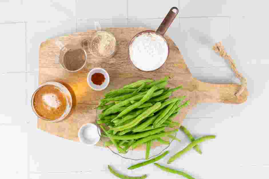 Fried Green Beans Recipe: In a dutch oven or a heavy-bottomed pot over medium heat, heat about two inches of oil to 365°F.
