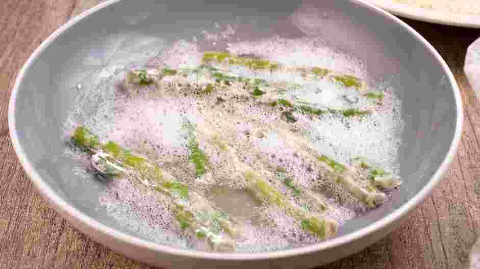 Green Bean Fries Recipe:
Shake off the excess flour of a few green beans and dip the green beans in the prepared egg whites.