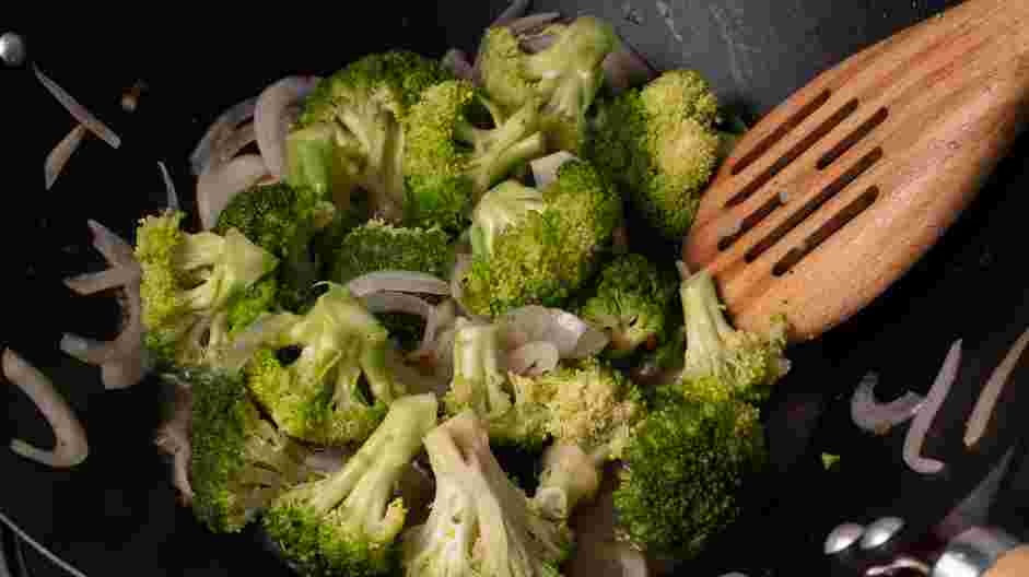 Shrimp and Broccoli Recipe: Add the broccoli florets and sliced onion to the skillet.