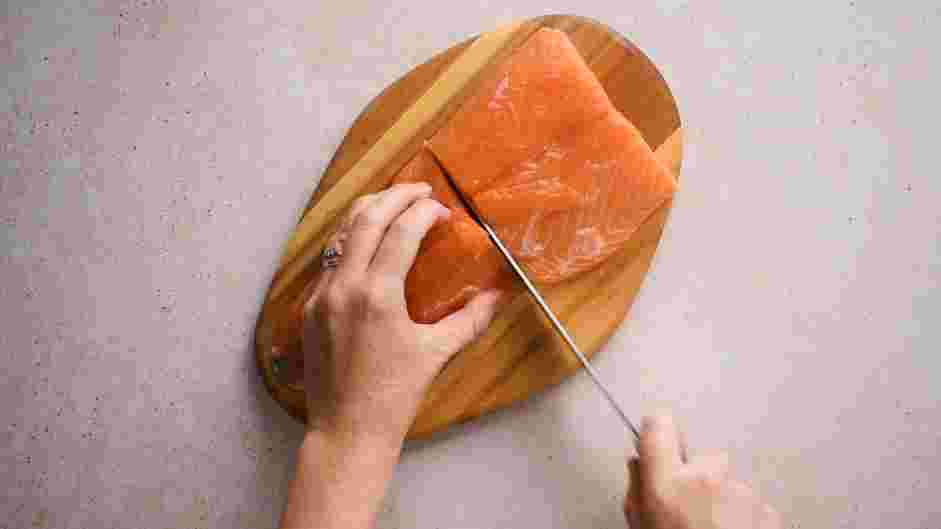 Simple Sake Salmon Recipe: Cut the salmon in half, producing two filets.