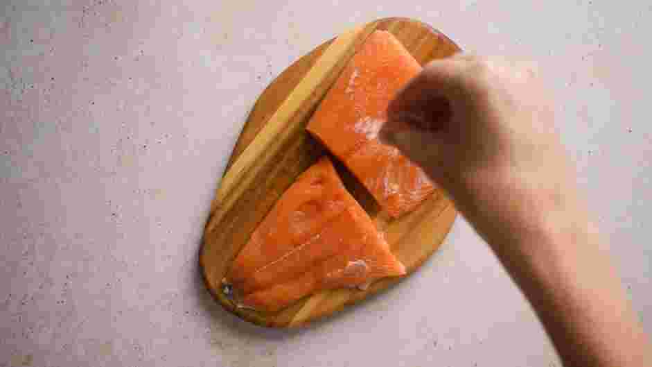 Simple Sake Salmon Recipe: Sprinkle the sea salt on both the skin and flesh sides of the salmon.