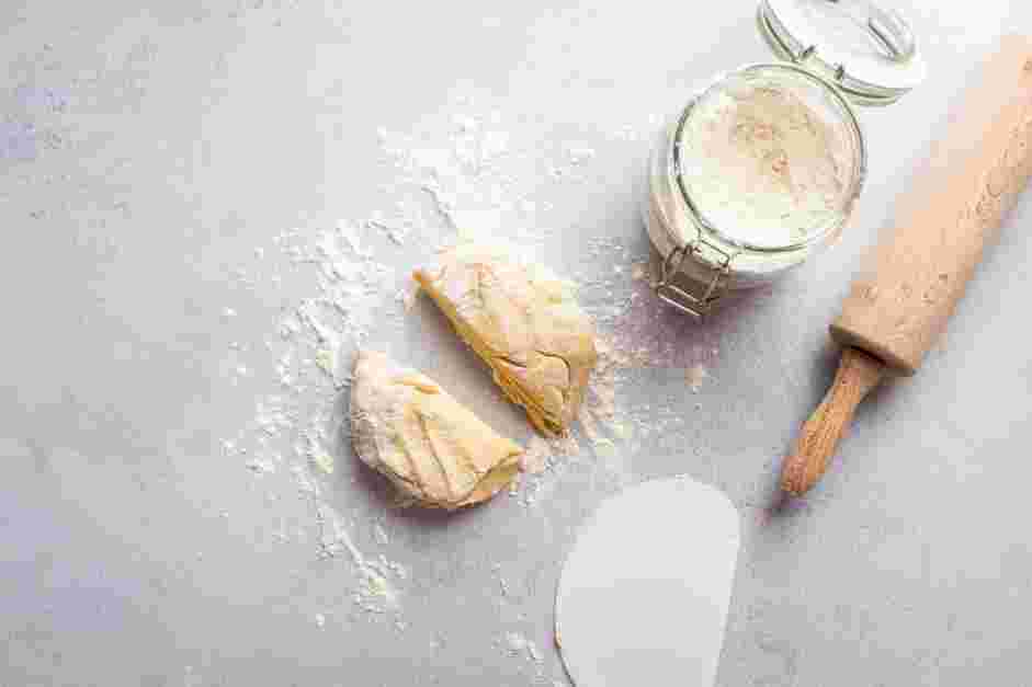 Crawfish Pie Recipe: 
Transfer the mixture to a floured surface and fold it a few times to bring the dough together.