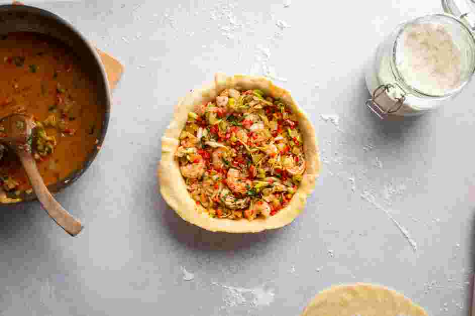 Crawfish Pie Recipe: Place the 10-inch circle in the pie pan.