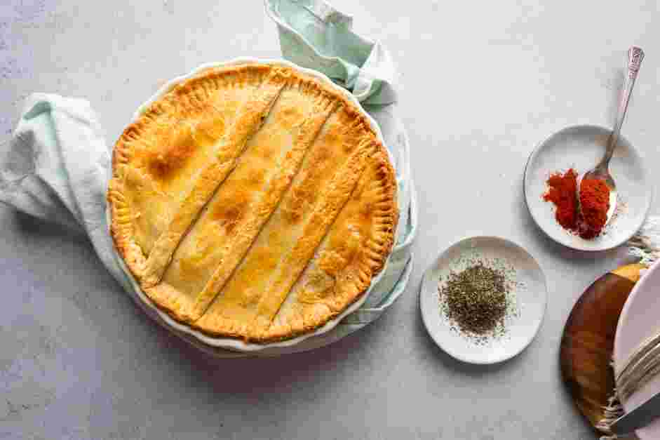 Crawfish Pie Recipe: Reduce the oven temperature to 375&deg;F.