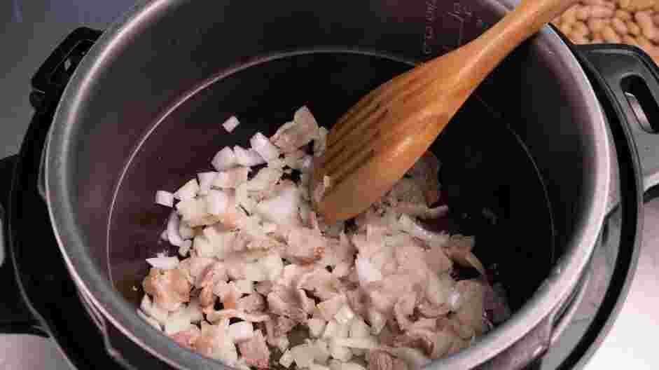 Instant Pot Baked Beans Recipe: Add the onions and sauté until translucent.