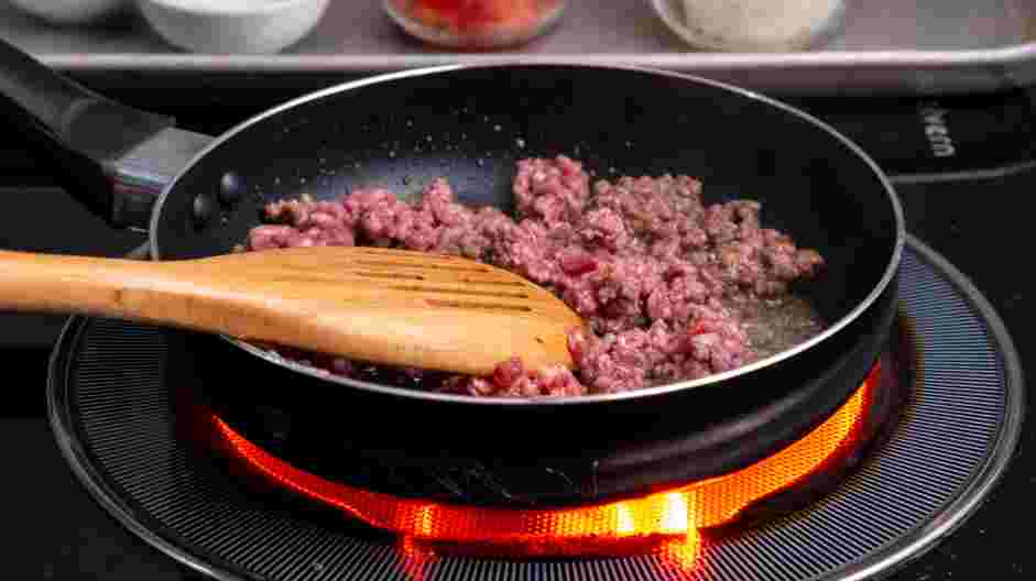 Breakfast Skillet Recipe: In a skillet over medium heat, fry the sausage until the fat is rendered.