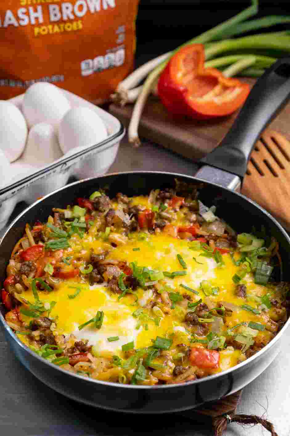 Breakfast Skillet Recipe: Garnish with chopped spring onions.