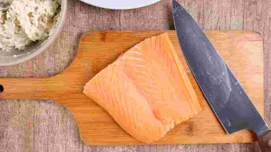 Crab Stuffed Salmon Recipe: Slice a pocket into each salmon filet.