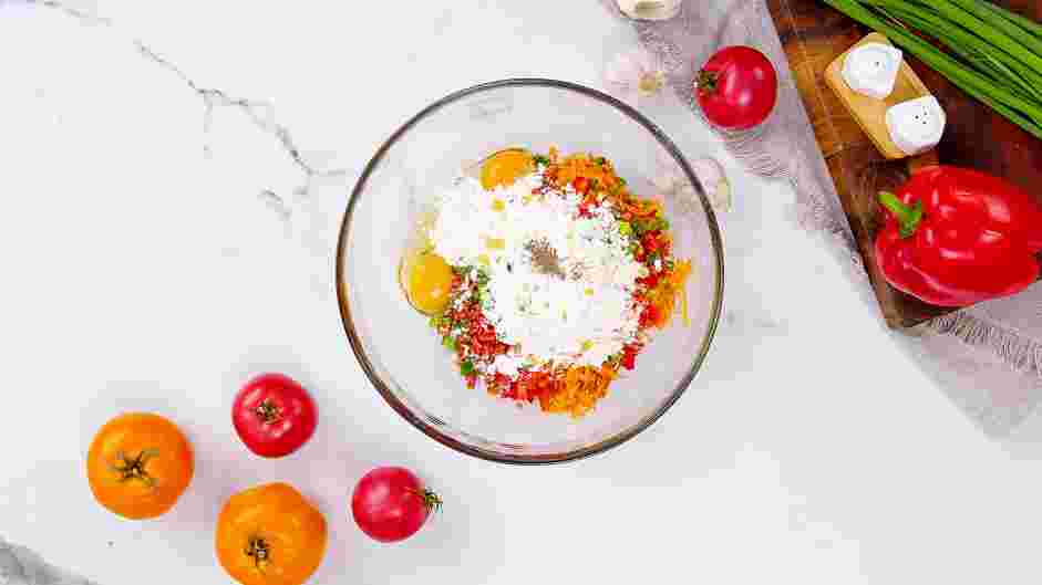 Sweet Potato Hash Browns Recipe: In a large bowl, add the sweet potatoes, bell peppers, green onions, eggs, flour, salt and black pepper.