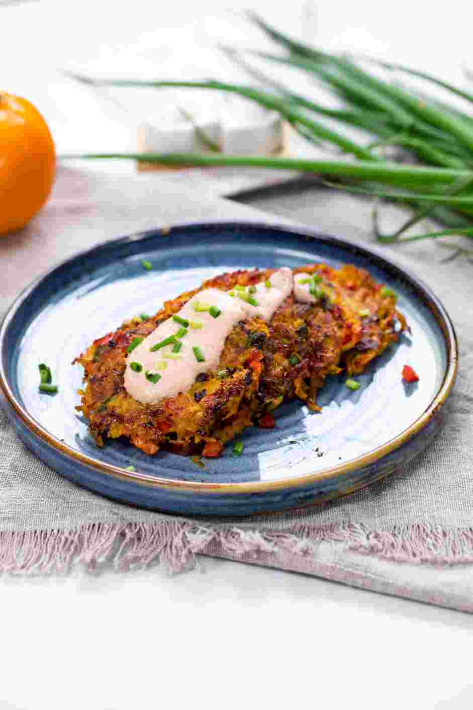 Sweet Potato Hash Browns Recipe: Serve the sweet potato hash browns paired with the spicy cream sauce.