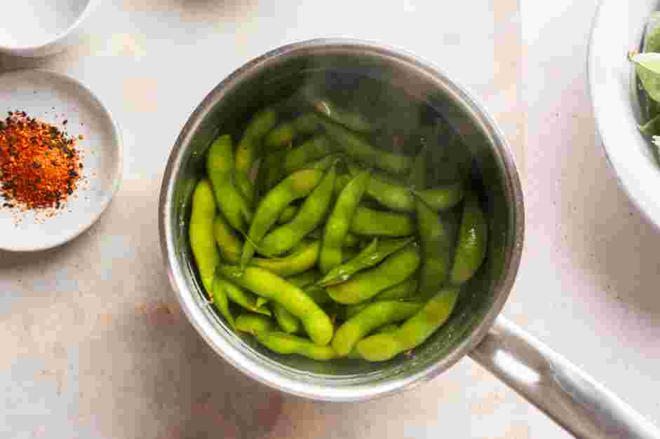 Spicy Edamame Recipe: 
Bring a pot of water to boil.