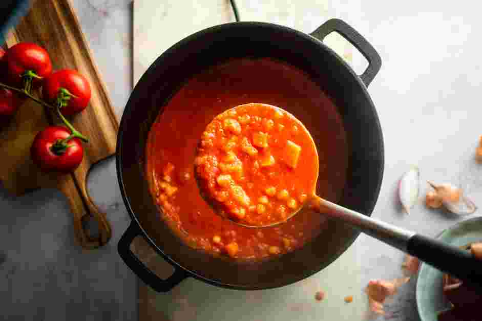 Creamy Tomato Soup Recipe: Scoop out the vegetables with a slotted spoon.