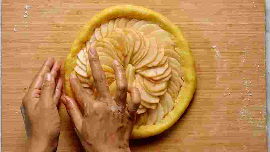 Pear Galette Recipe: 
Fold the edges of the dough, lifting and pressing the edges up and over the fruit.