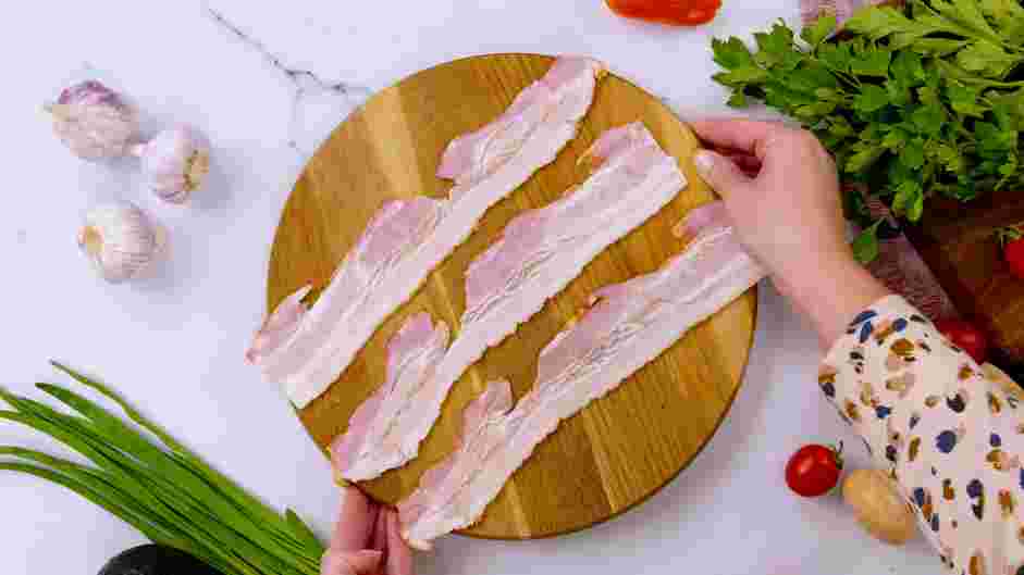 Potato Salad with Bacon Recipe: While the potatoes are cooking, chop the bacon strips into ½-inch pieces.