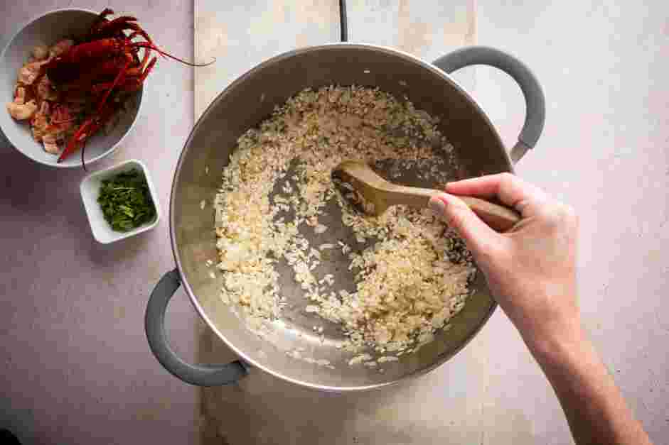 Lobster Risotto Recipe: Add &frac12; cup of arborio rice and saut&eacute; for about 3-4 minutes.