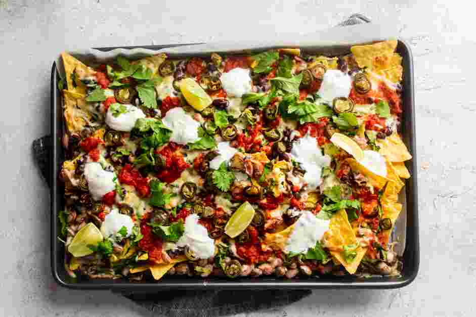 Sheet Pan Nachos Recipe:
Bake at 350°F until the cheese melts and starts to bubble.