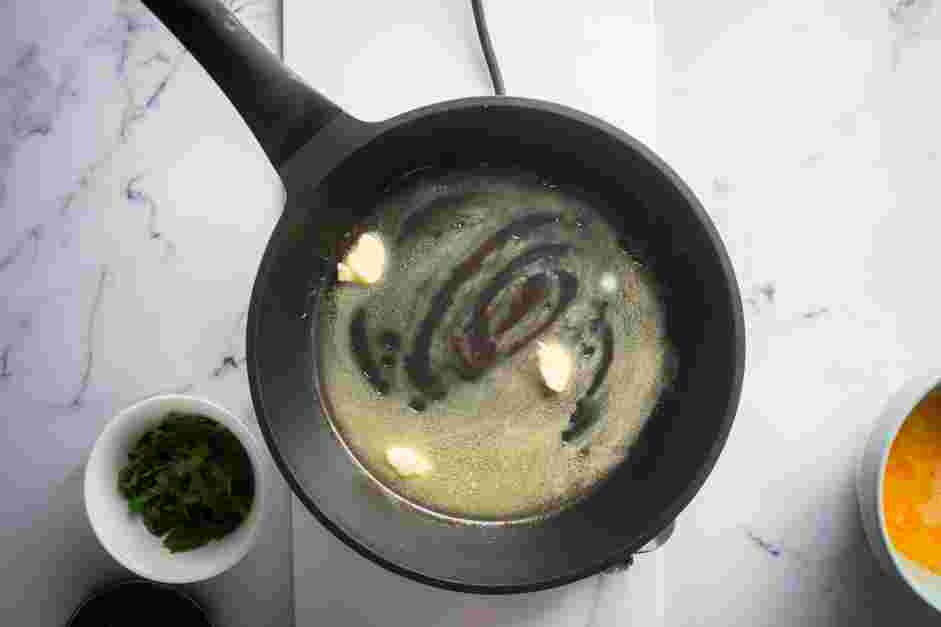 Spinach Omelette Recipe: In a non-stick omelette pan or skillet over medium heat, melt the butter.