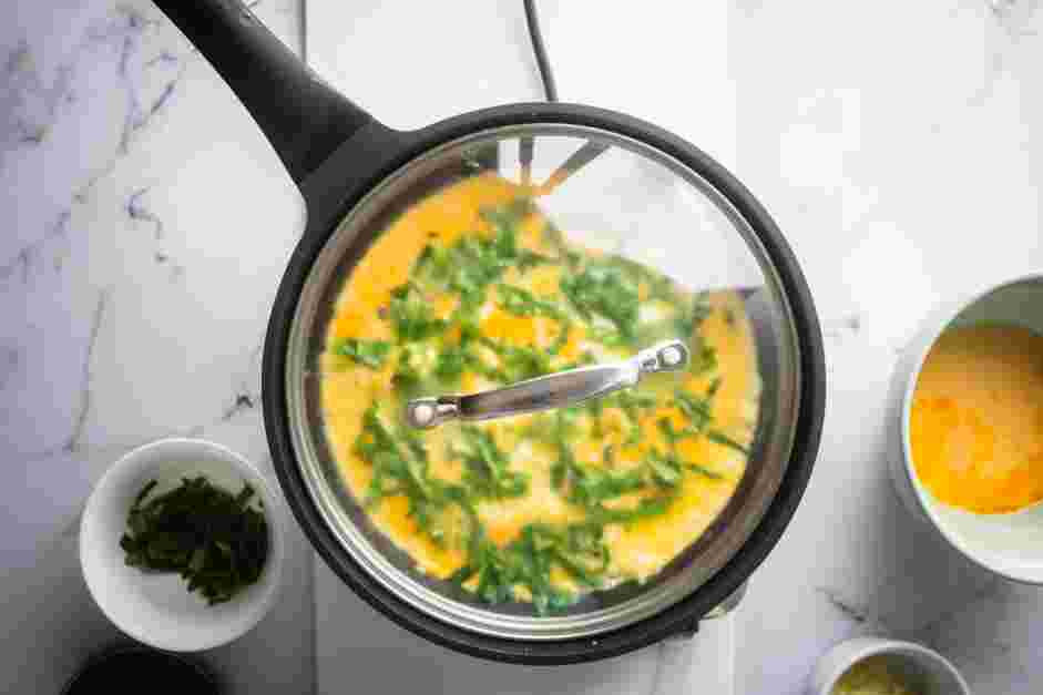 Spinach Omelette Recipe:
Lightly press the spinach leaves and herbs into the egg and cheese as they cook.