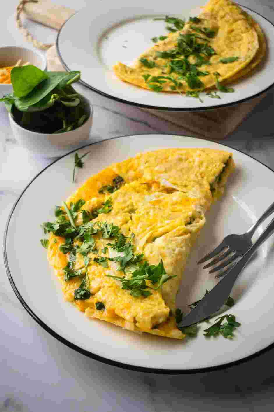 Spinach Omelette Recipe: Serve warm on a warm plate.