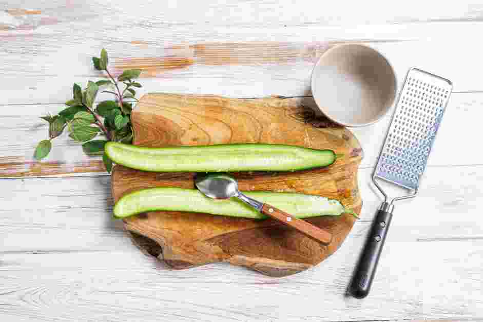 Cucumber Dip Recipe: Slice the cucumber lengthwise and remove the cucumber seeds with a spoon.