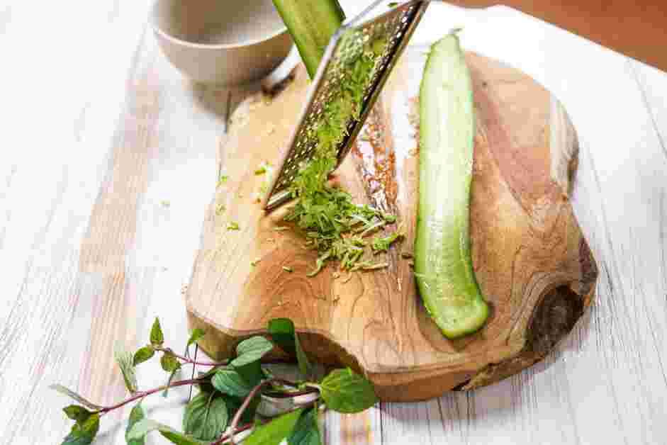 Cucumber Dip Recipe: Grate the cucumber.