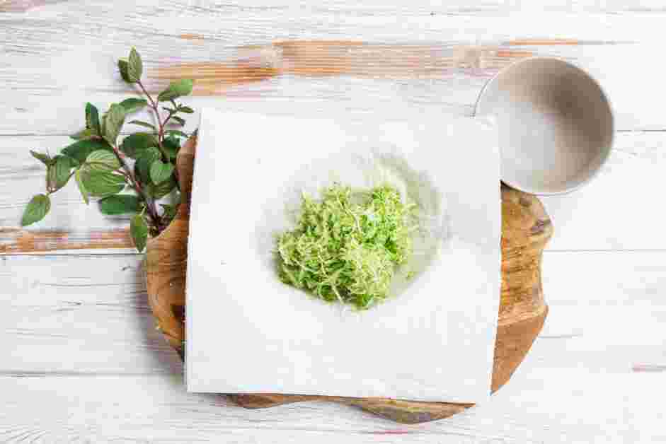 Cucumber Dip Recipe: Transfer the grated cucumber to a cheesecloth or a paper towel and squeeze to remove as much moisture as possible.