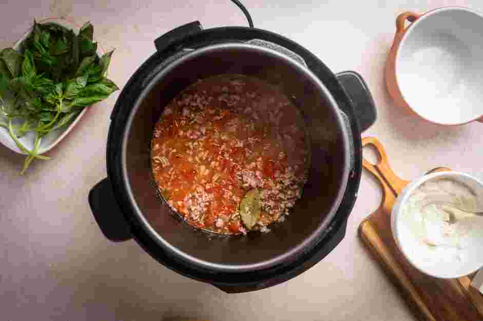 Instant Pot Lasagna Soup Recipe: Add the tomato paste and cook for 2 minutes.