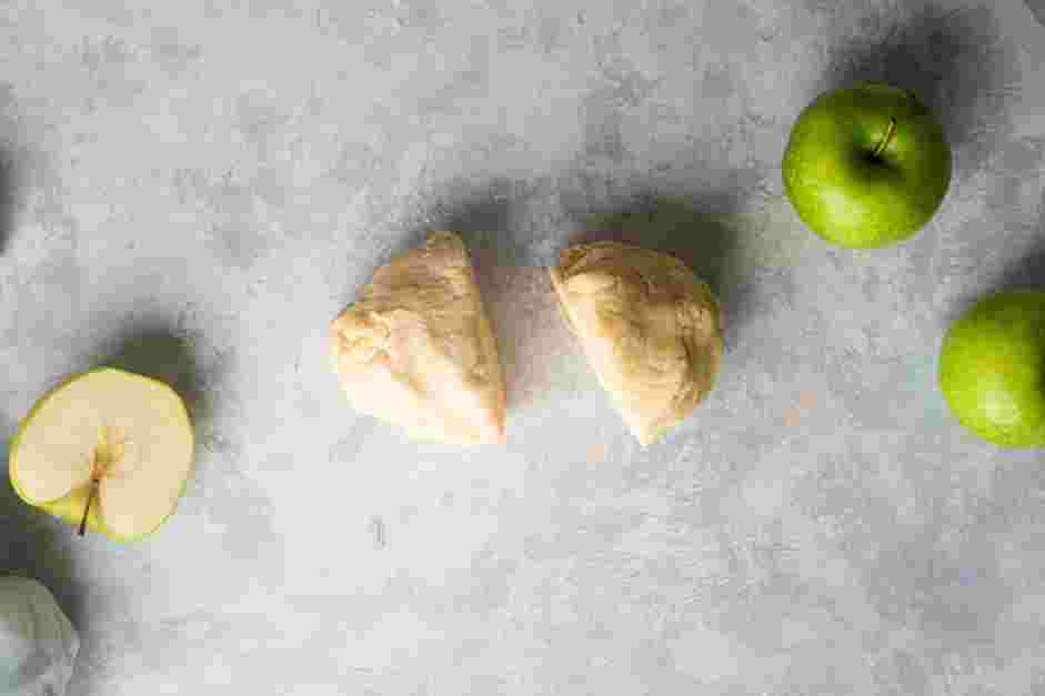 Mini Apple Pies Recipe:
Turn the dough out onto a clean countertop and divide it in half.