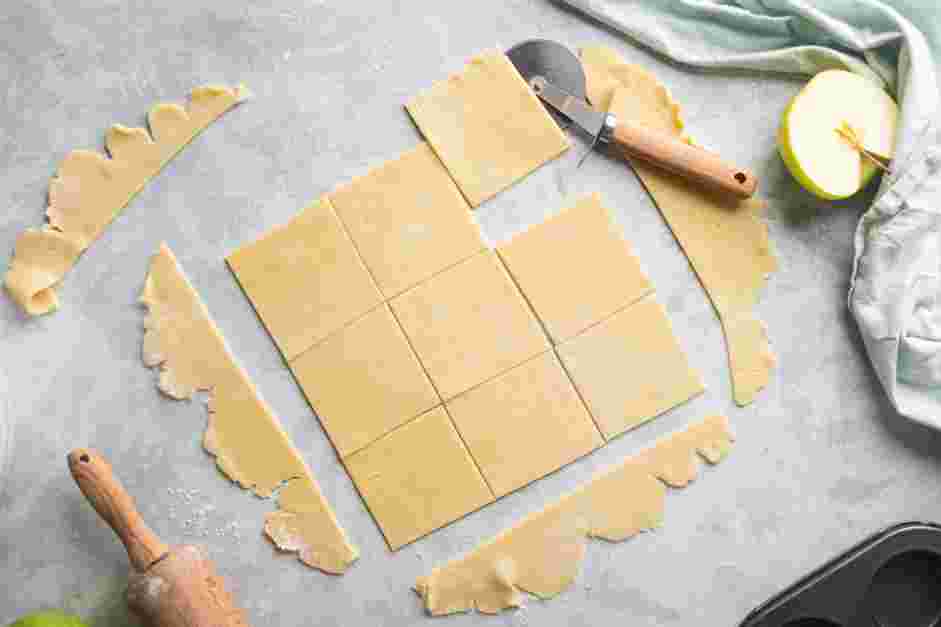 Mini Apple Pies Recipe: Cut the dough into thirds in one direction, then the other, to form nine small squares.