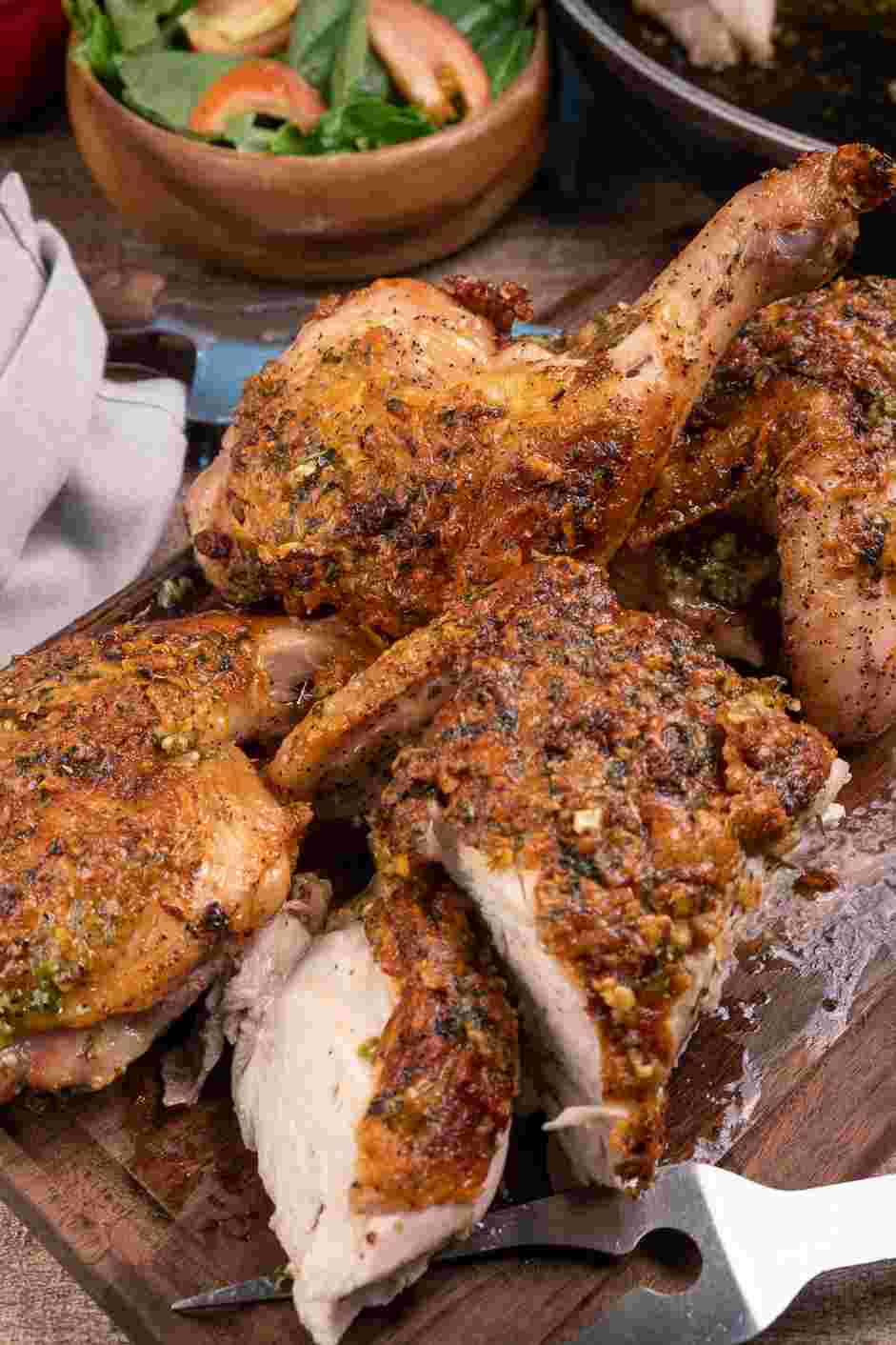 Brick Chicken Recipe: Carve the chicken and serve warm with a side salad or roasted vegetables.