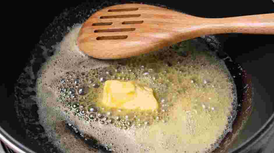 Honey Butter Fried Chicken Recipe: In a large saucepan, melt the butter over medium heat.