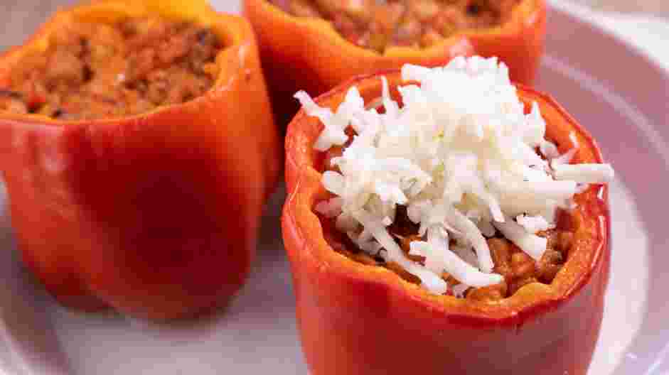 Sausage Stuffed Peppers Recipe:
Remove from the oven and sprinkle with the remaining cheese and bake for another 5-10 minutes or until the peppers are tender and the cheese is browned.