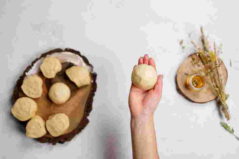 Butter Roll Recipe: 
Remove the dough from the bowl and deflate it by gently pushing it down.