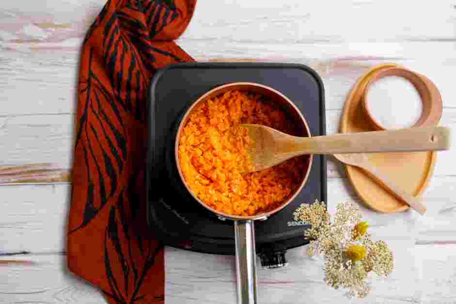 Carrot Halwa Recipe: When butter is slightly warm, add the chopped carrots and sauté until translucent, about 10 minutes.