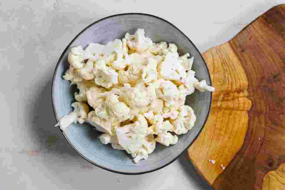 Cilantro Lime Cauliflower Rice Recipe: Cut the cauliflower into florets.