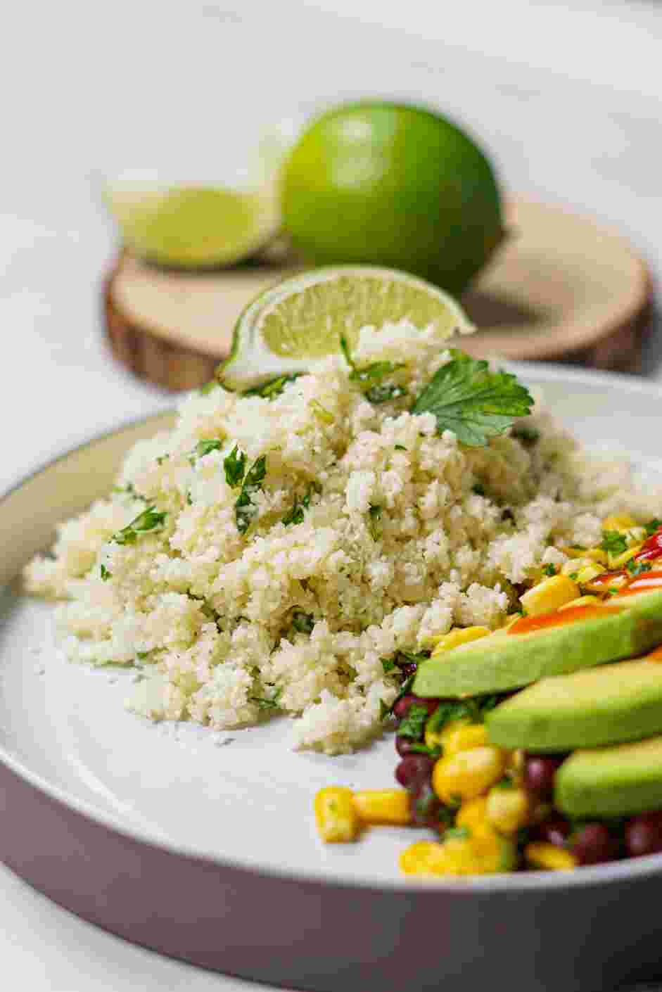 Cilantro Lime Cauliflower Rice Recipe: Serve immediately paired with your favorite Mexican dish.