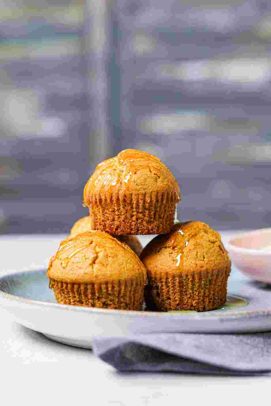 Cornbread Muffins Recipe: Serve plain or slathered with butter and drizzled with honey.