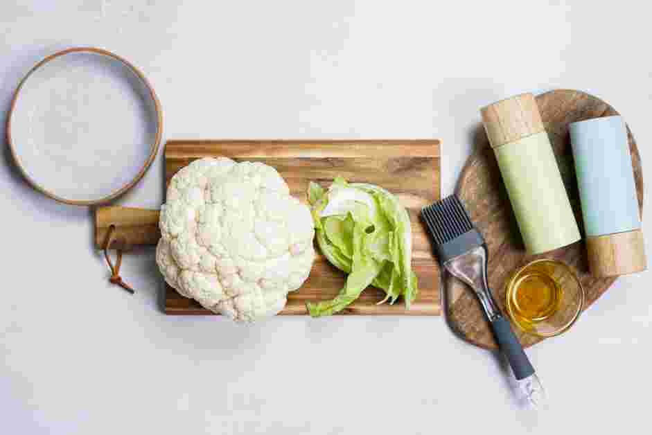 Grilled Cauliflower Steaks Recipe:
Preheat the grill or a grill pan to medium heat.