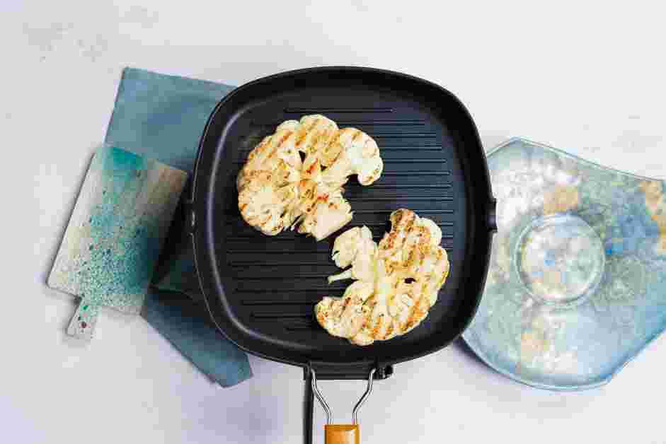 Grilled Cauliflower Steaks Recipe:
Place the cauliflower steaks on the grill, and grill for 5-7 minutes on each side or until the cauliflower are crisp-tender.