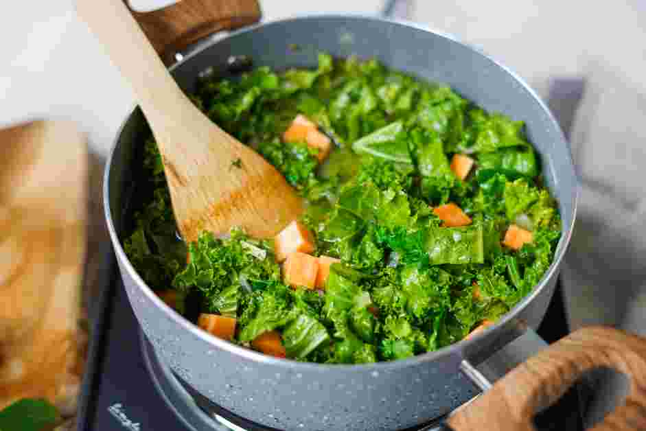 White Bean and Kale Soup Recipe: Raise the heat to high and bring the soup to a boil.