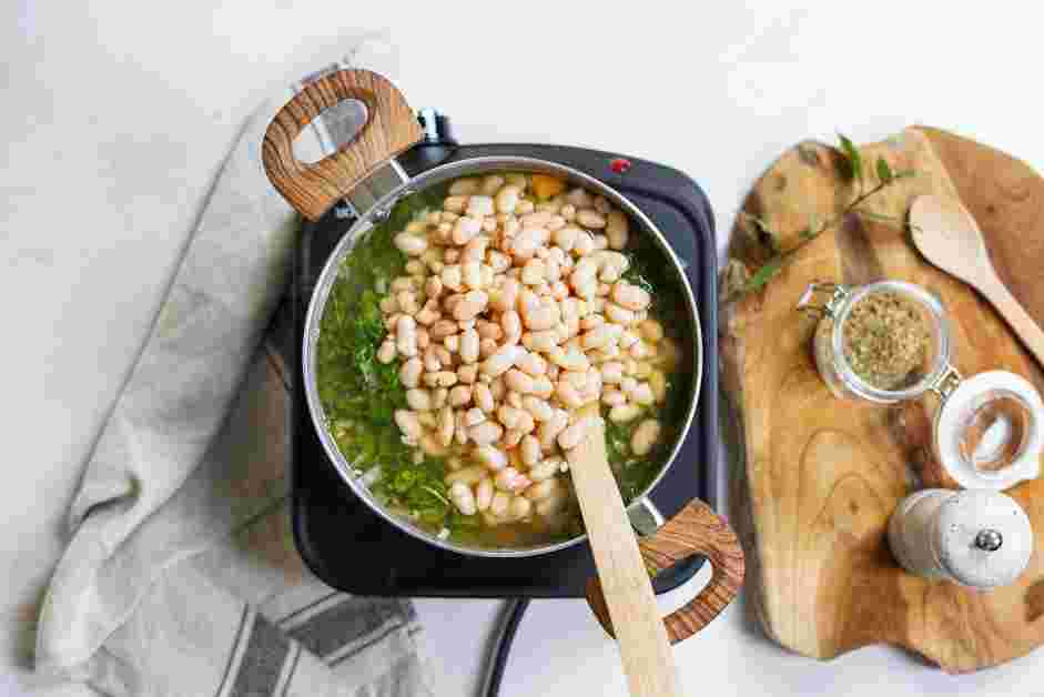 White Bean and Kale Soup Recipe: 
Once the soup reaches a boil, lower the heat to medium and add the beans and cook until all the vegetables are tender, about 20-30 minutes.