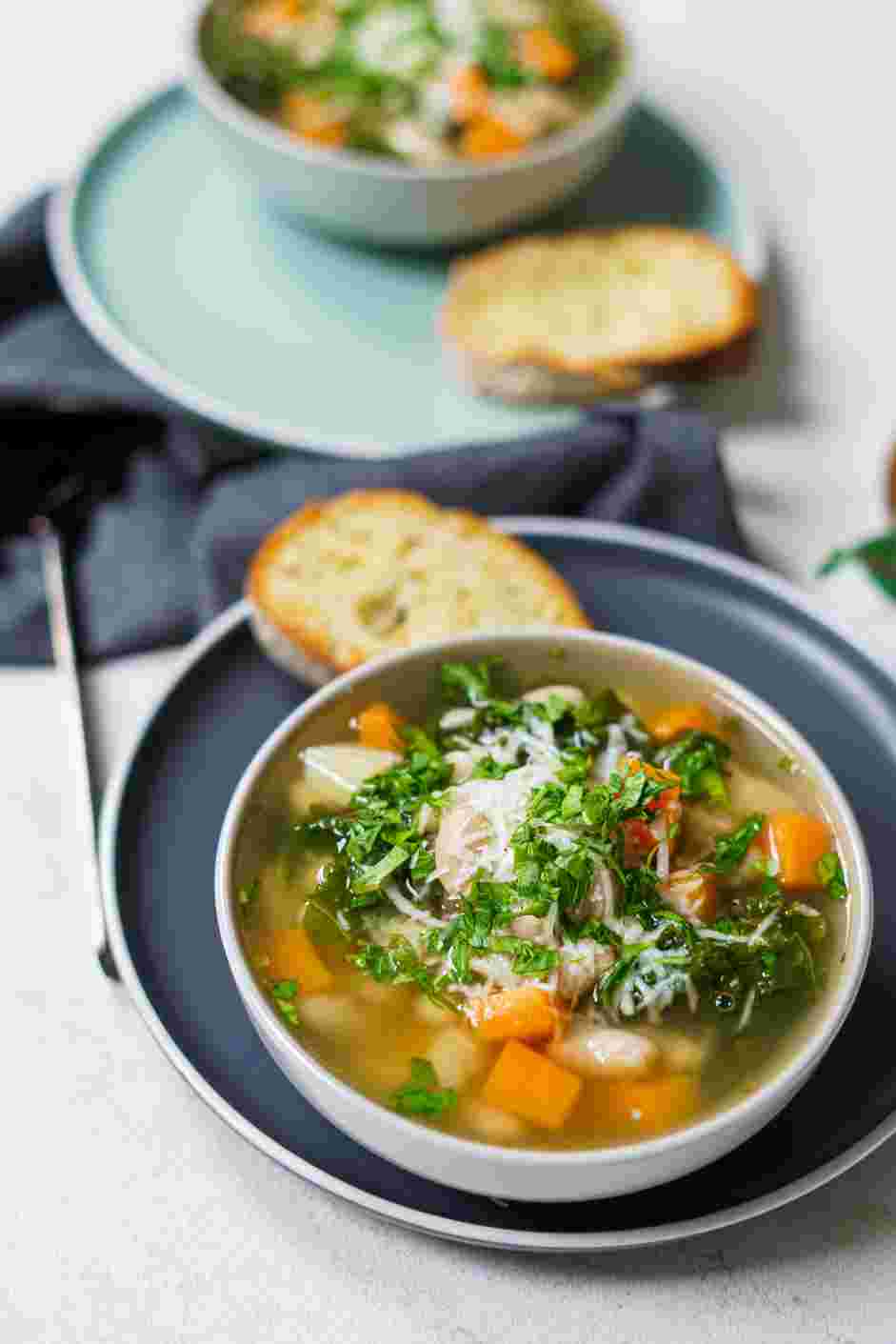White Bean and Kale Soup Recipe:
Ladle into bowls, top with freshly grated Parmesan and parsley.