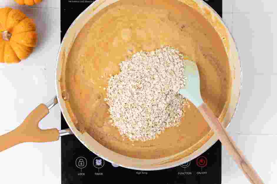 Pumpkin Oatmeal Recipe: Stir in the rolled oats and lower the heat to medium-low.