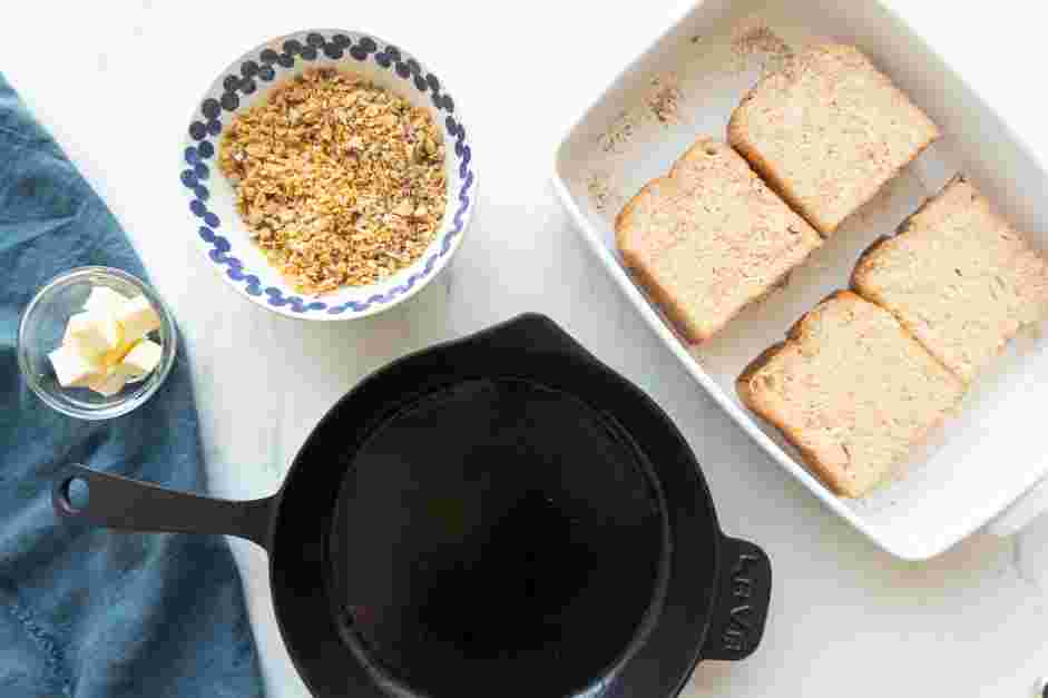 Eggnog French Toast Recipe:
In a large shallow bowl, add the cornflakes and crush them with your hands until large crumbs form.