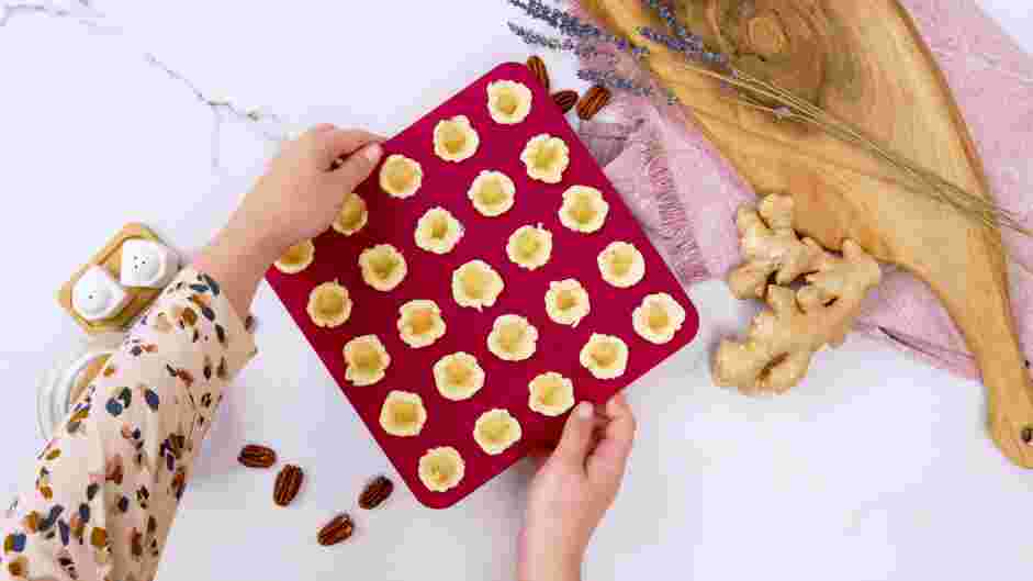 Mini Pecan Pies Recipe: Preheat the oven to 350°F.