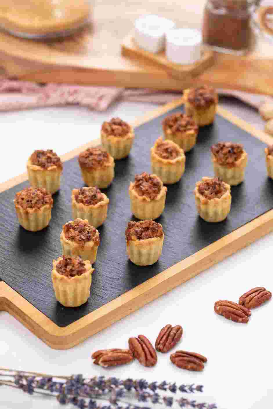 Mini Pecan Pies Recipe: Finish baking the mini pies until golden and set, about 15-17 minutes.