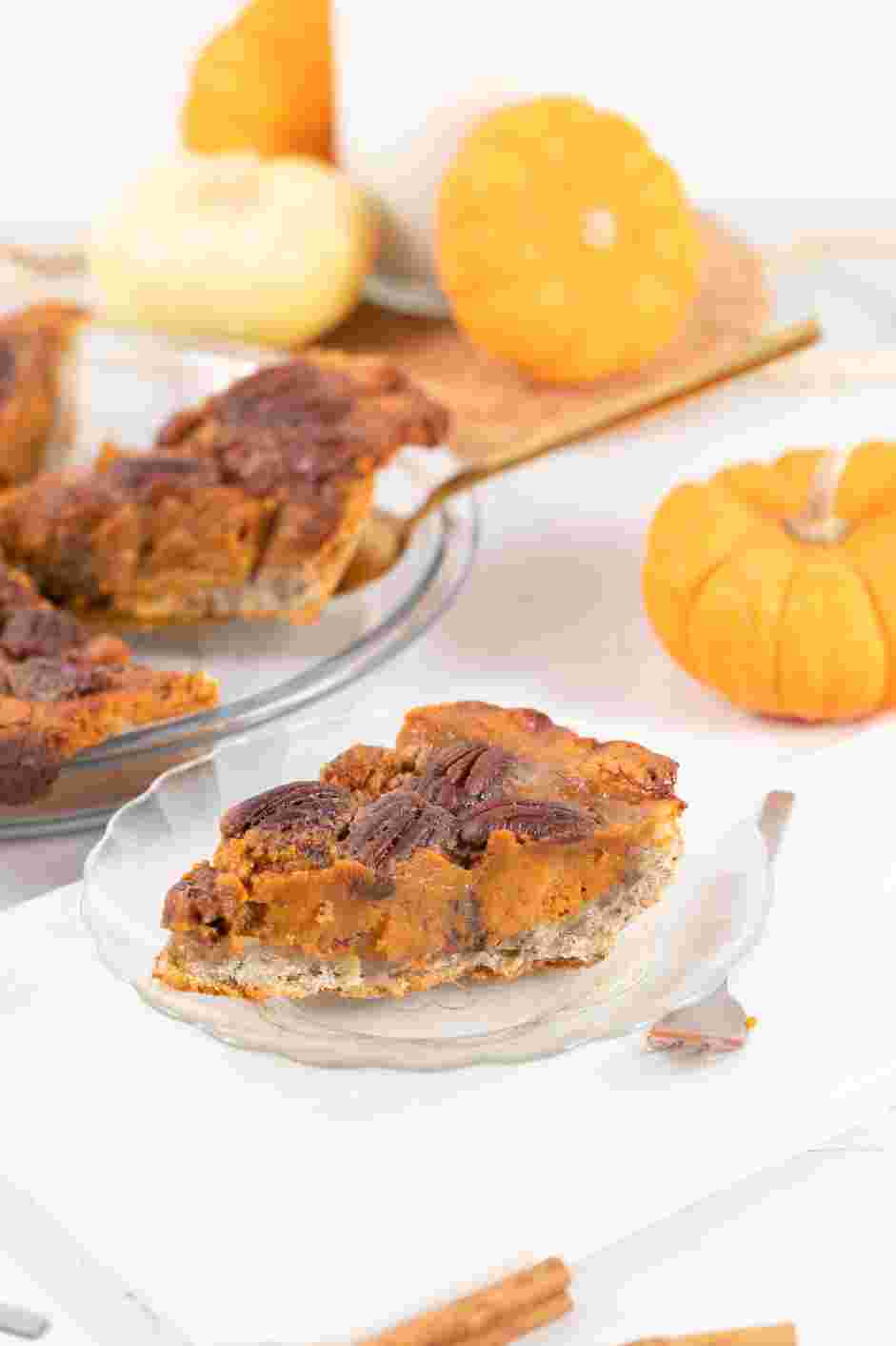 Pumpkin Pecan Pie Recipe: 
Place the pie pan on a baking sheet and bake for 45&ndash;50 minutes, until solid in the center and the crust is golden brown.