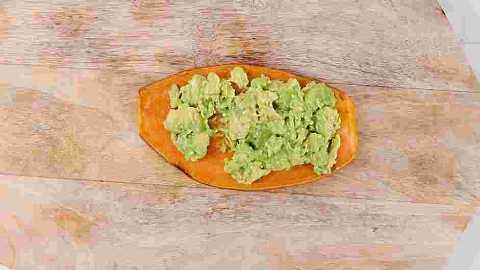 Sweet Potato Toast Recipe: For the savory sweet potato toast, top the sweet potato with the mashed avocado.